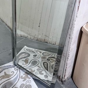 Stainless steal frame mirror.